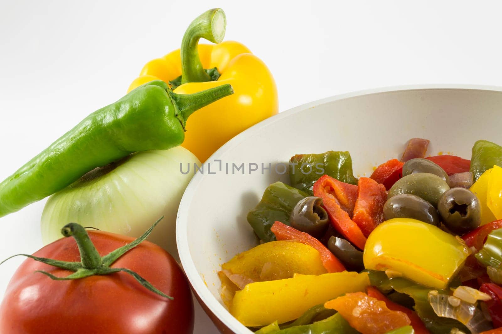 peppers, onions, tomatoes and olives a bit of olive oil and there you have a nice flat