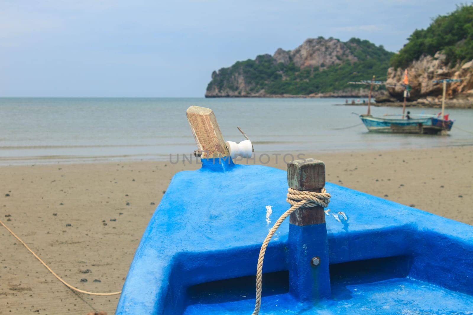 Fishing boat on the beach in summer