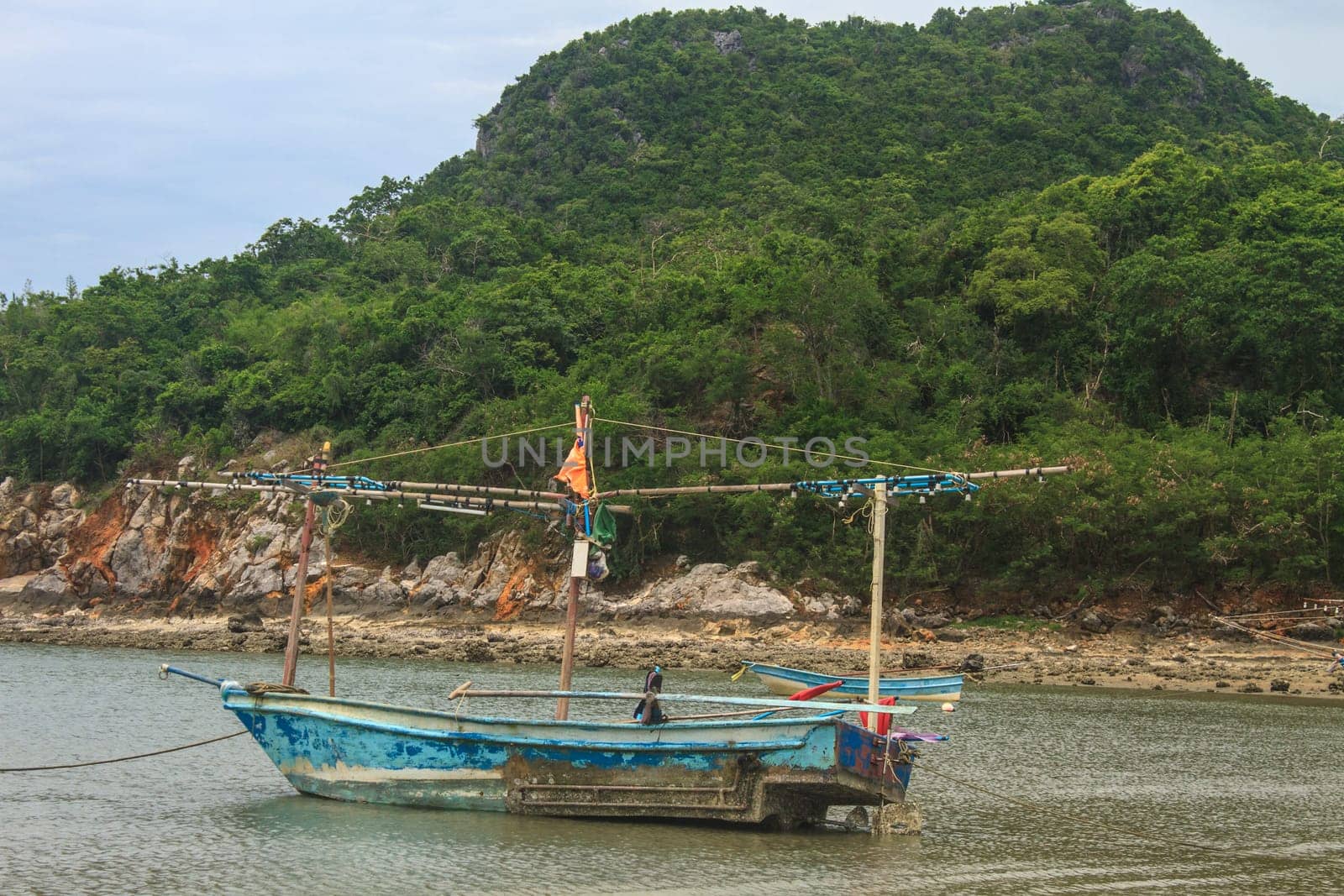 Fishing boat on the beach in summer