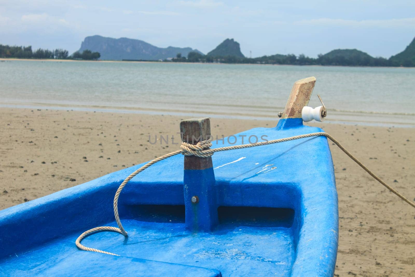 Fishing boat on the beach in summer