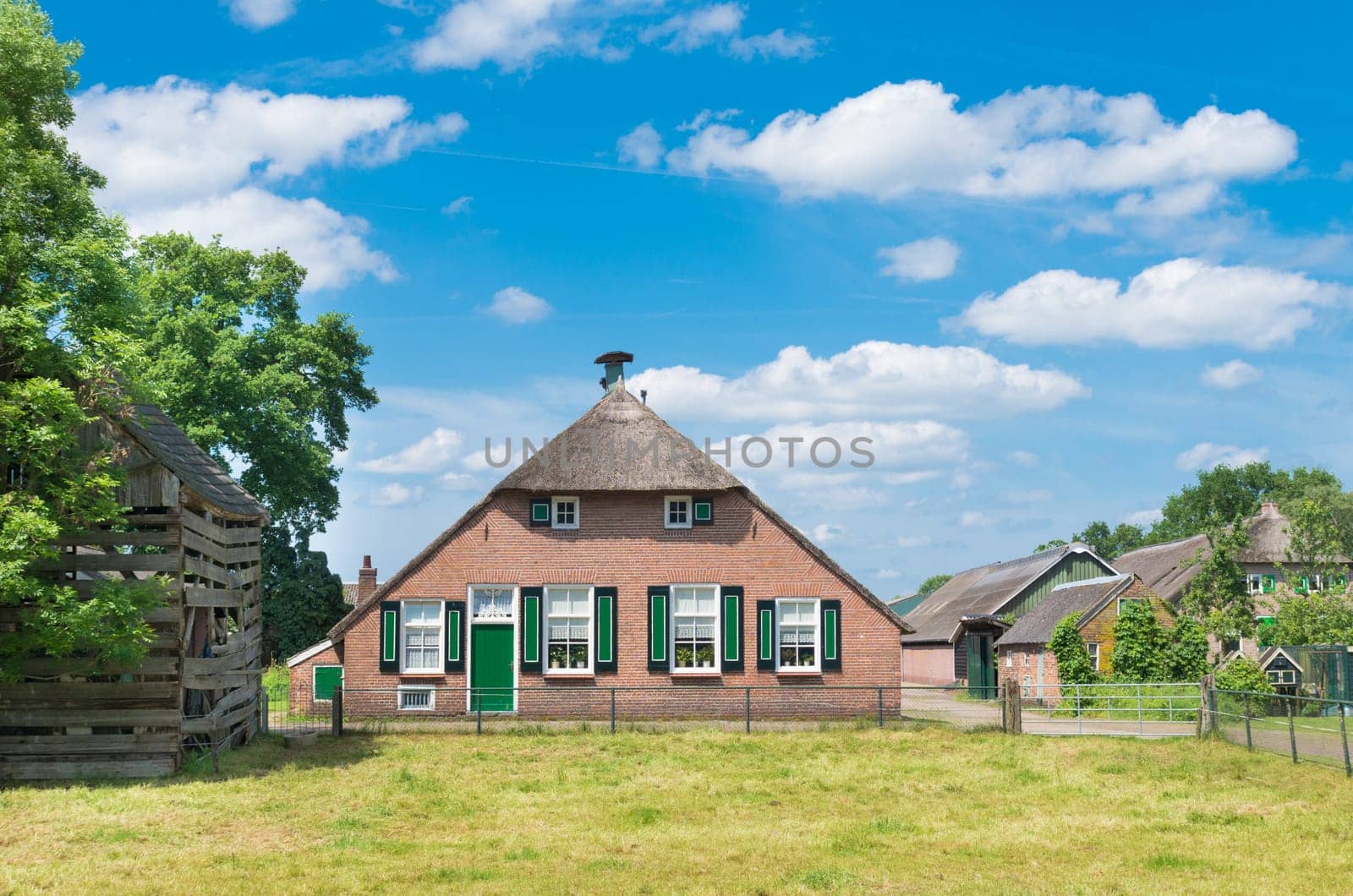 typically dutch farmhouse in staphorst. The community of Staphorst is known as one of the most religious in the Netherlands and has a very closed character