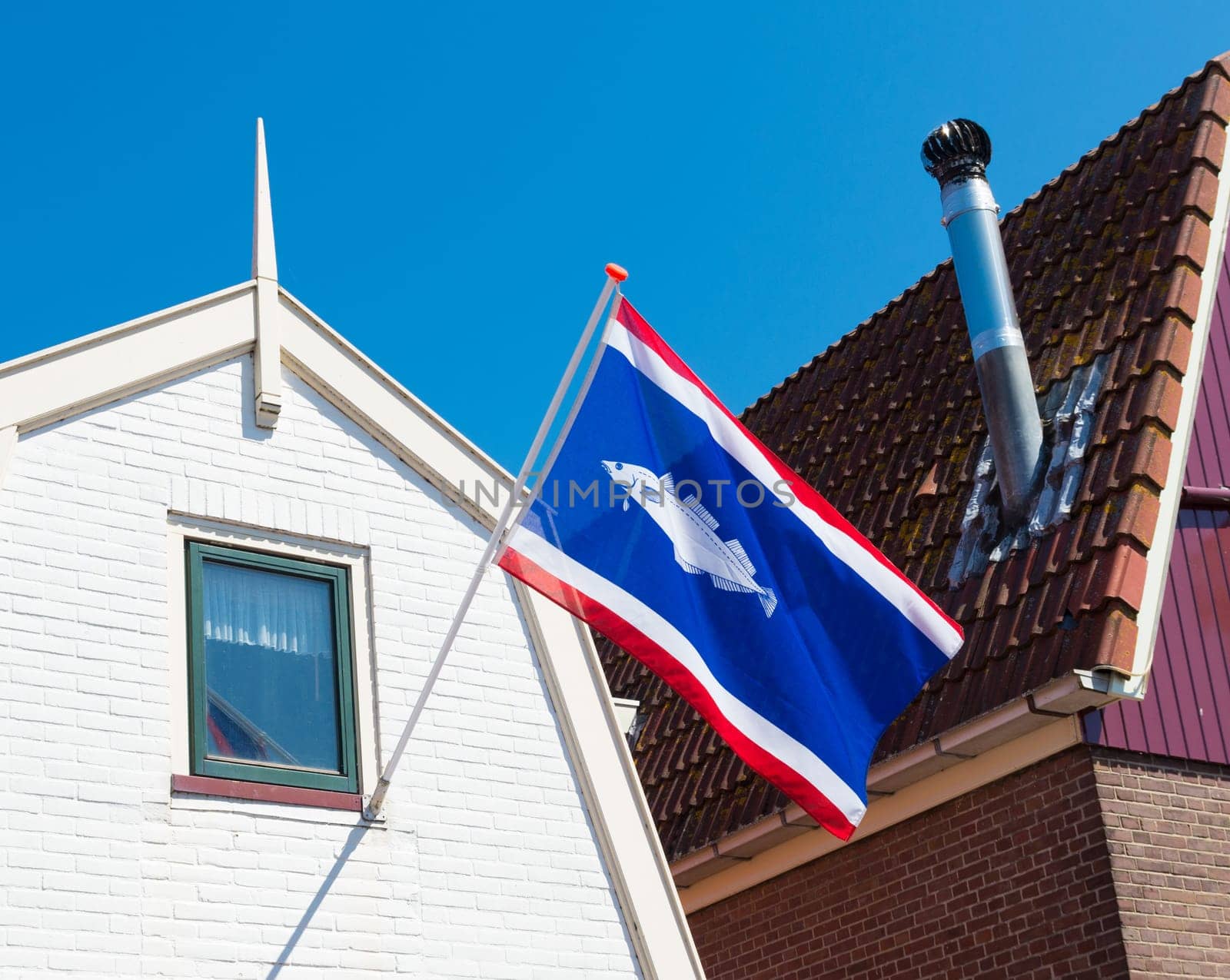 official flag of the fishing village Urk in the netherlands. The municipality of Urk differs in economic, religious and demographic as well as on the average income, largely on the Dutch averages.