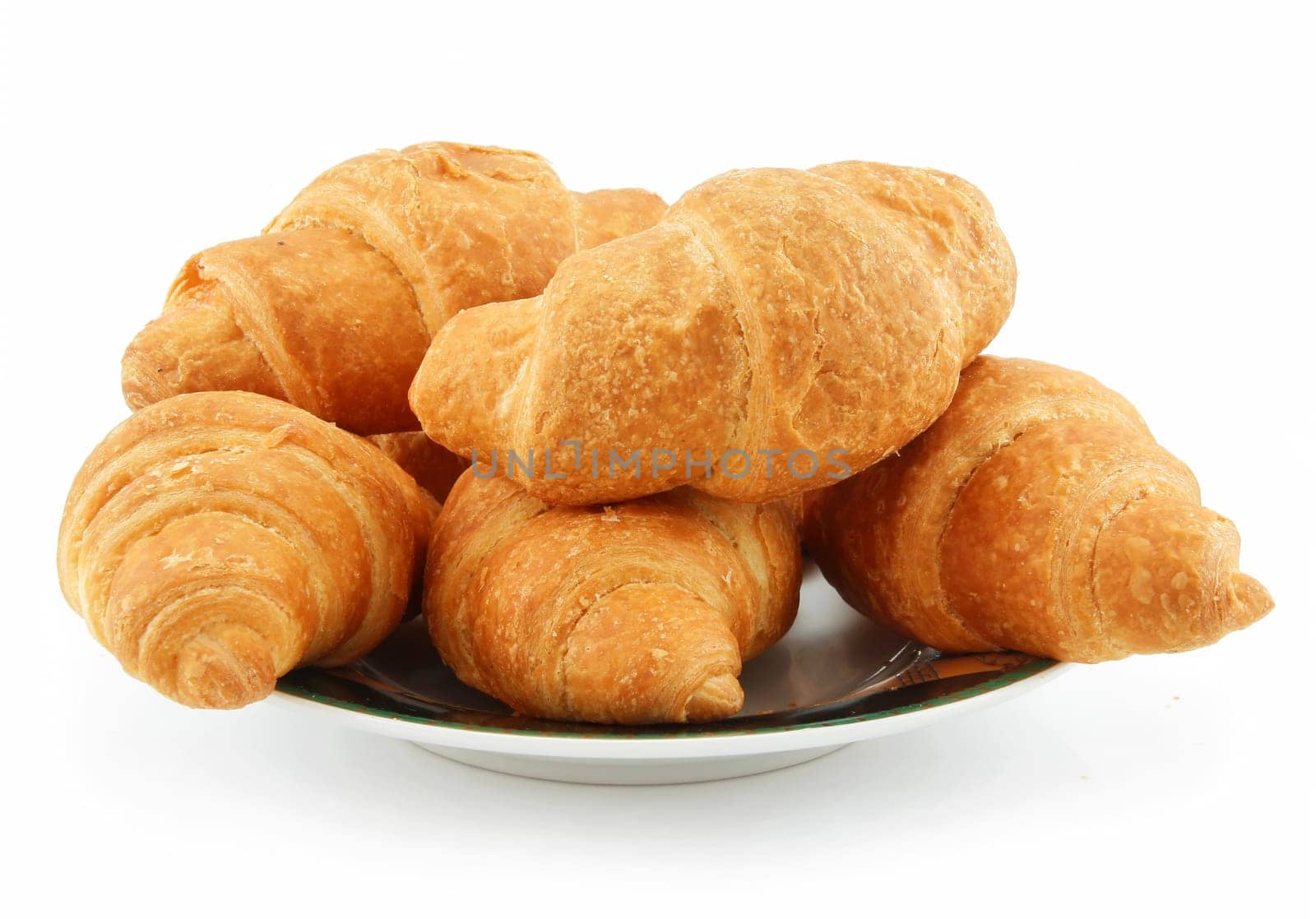 Group of Croissants on Saucer Isolated on White Background