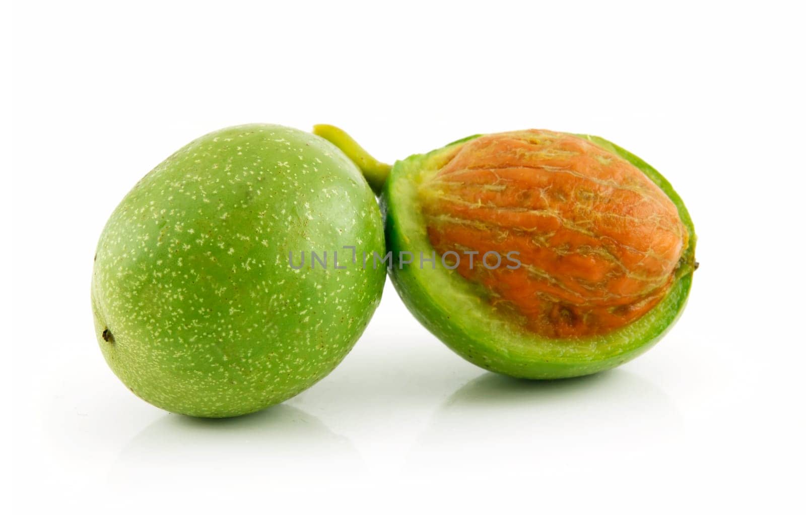 Ripe Broken Walnuts Isolated on White Background