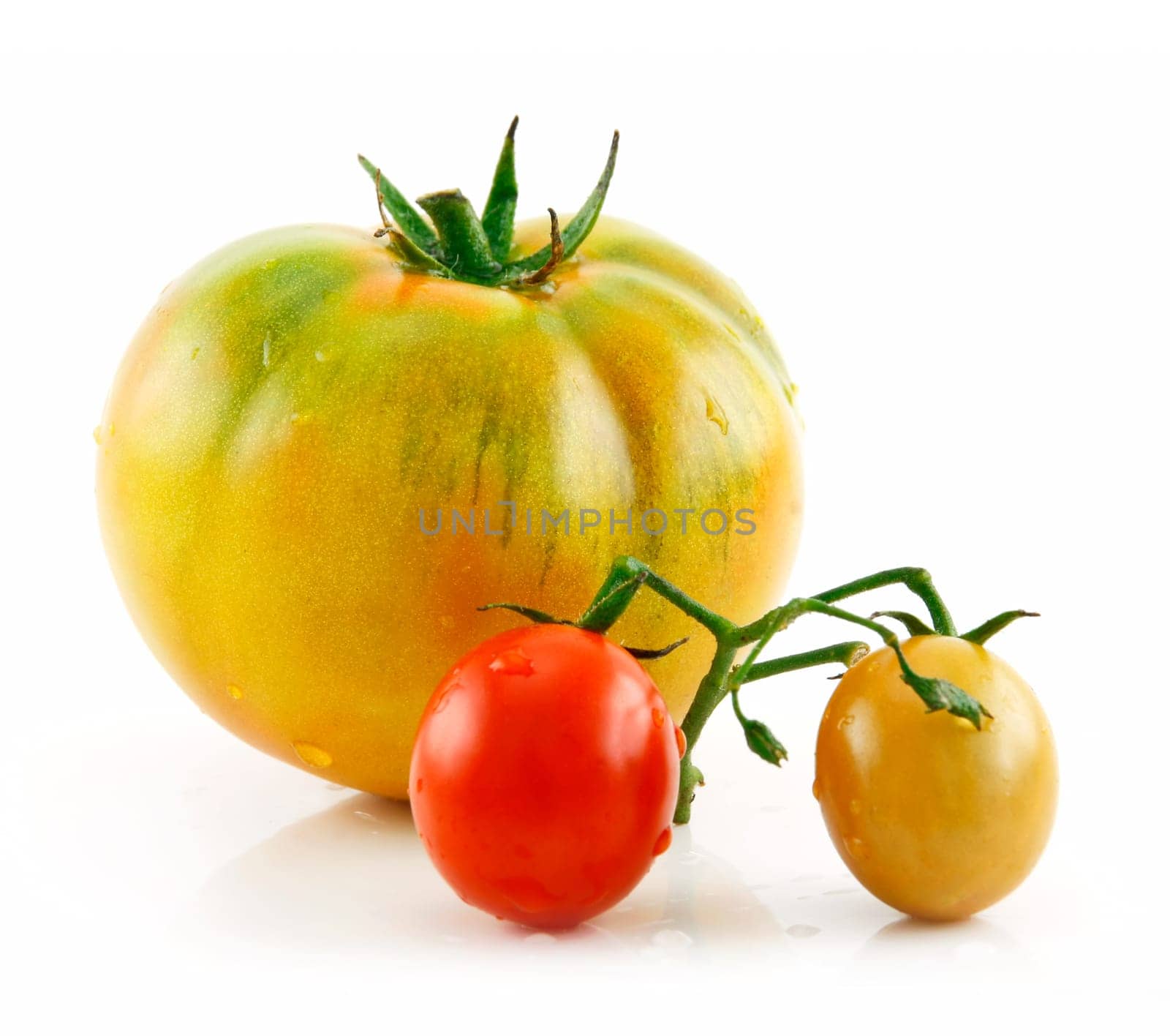 Ripe Wet Yellow and Red Tomatoes Isolated on White Background