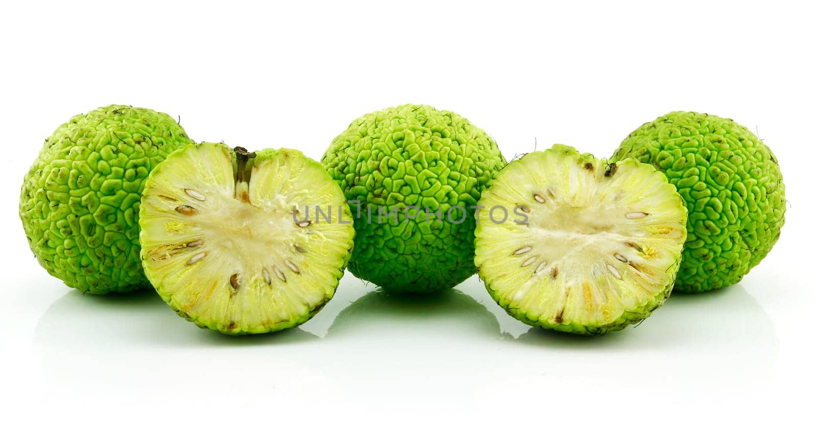 Sliced Osage Oranges (Maclura) Isolated on White Background