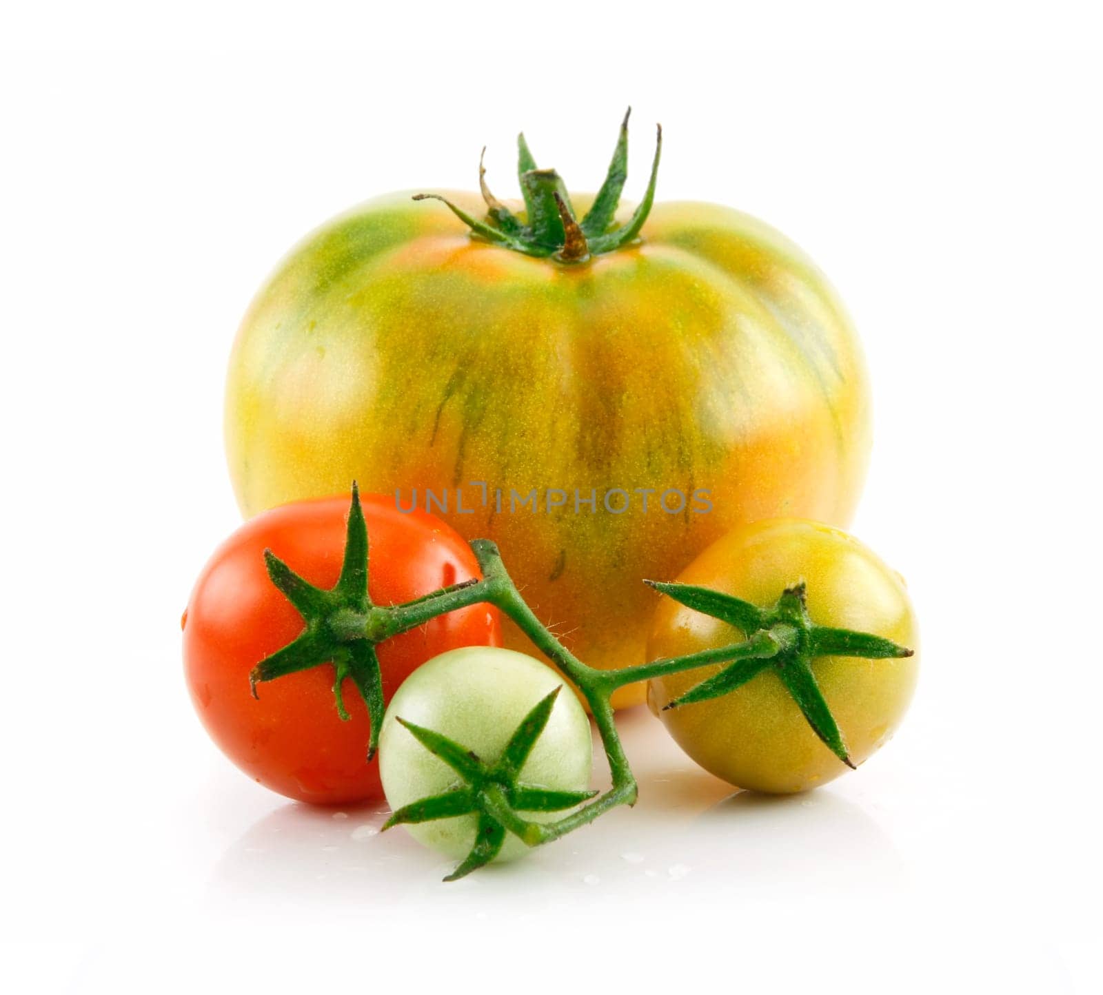 Ripe Wet Red and Green Tomatoes Isolated on White Background