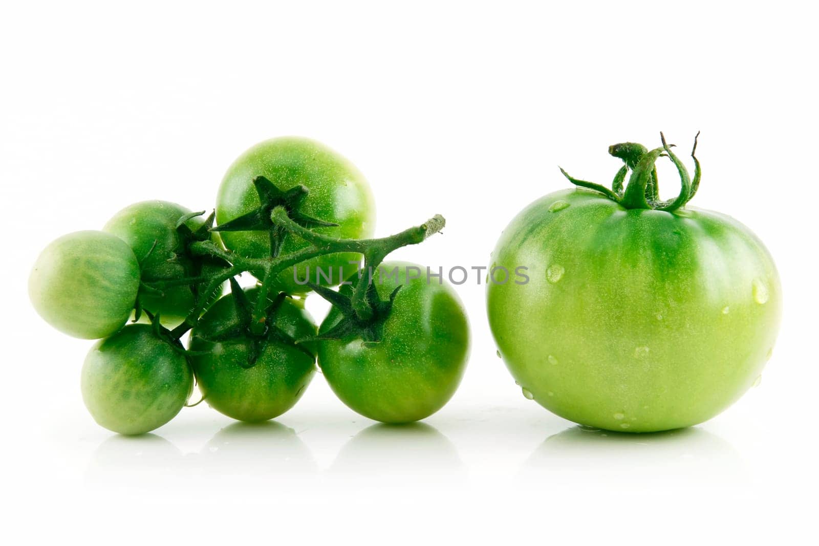 Ripe Wet Green Tomatoes Isolated on White Background