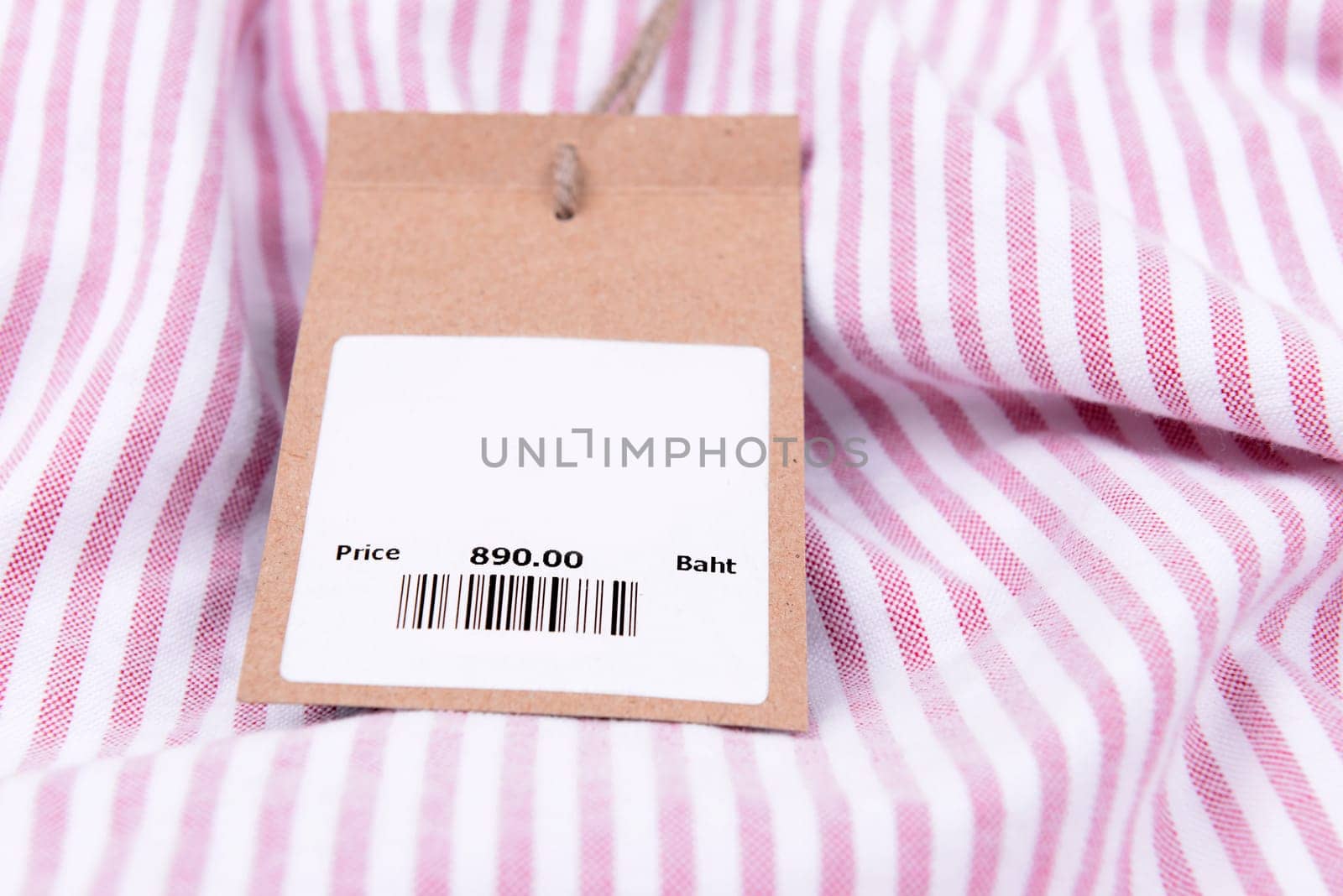 price tag with barcode on a shirt