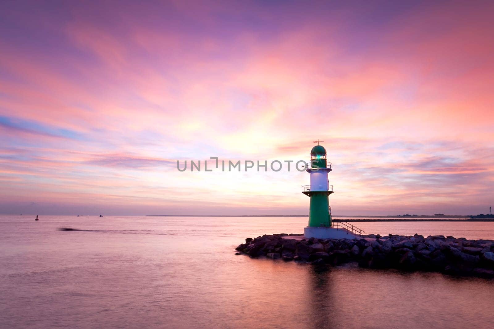 Sunrise at the lighthouse Warnemünde