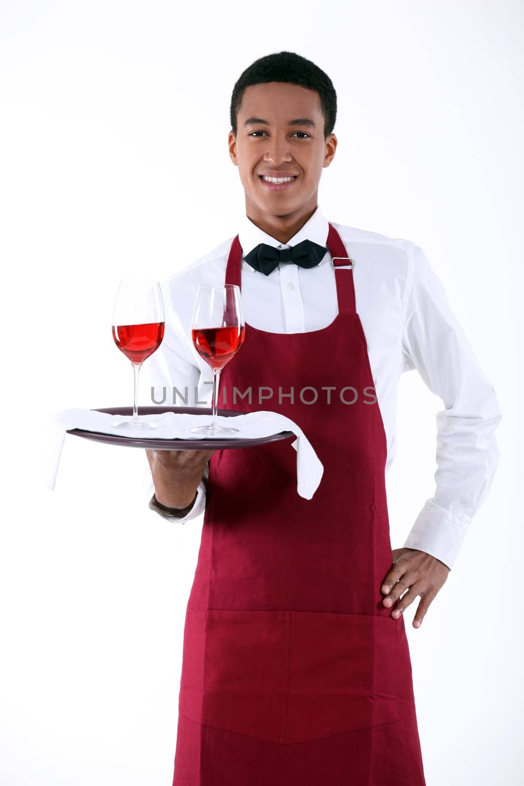 wine waiter serving two glasses of wine