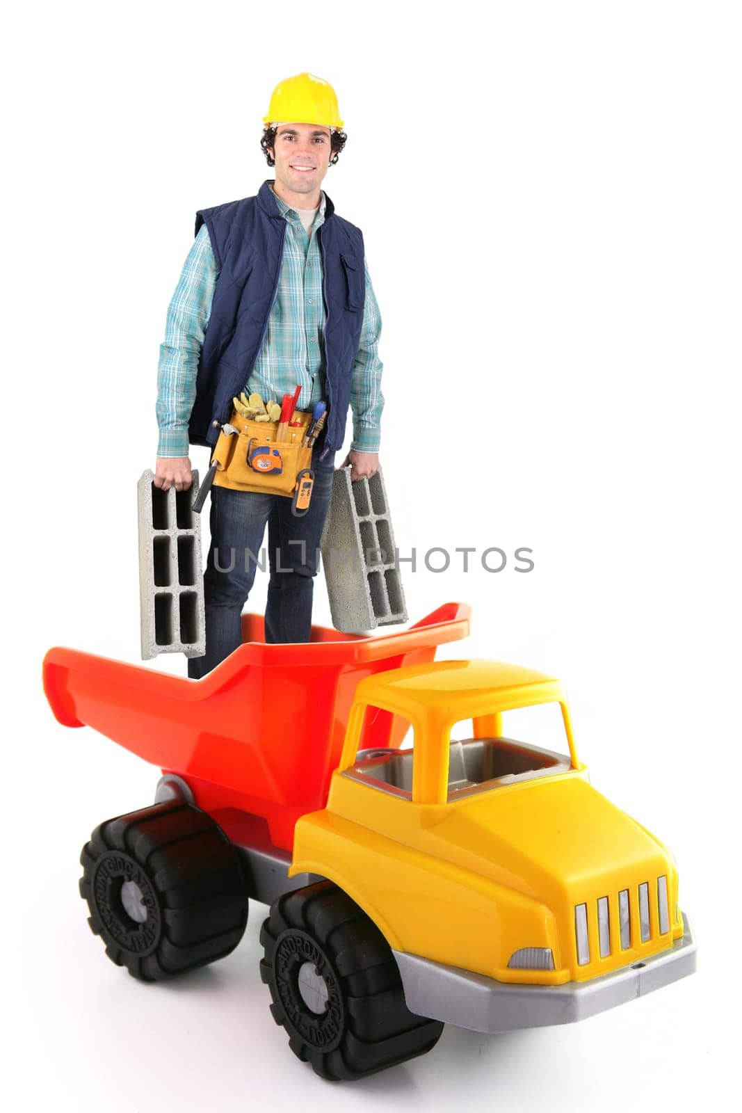 Building worker standing in plastic truck