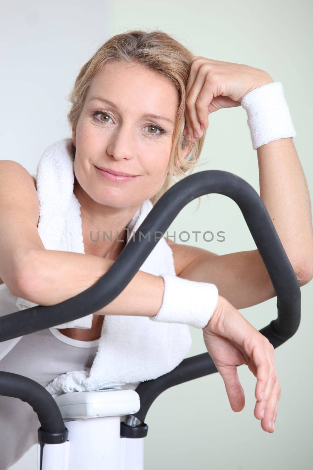 mature woman doing exercises in the gym