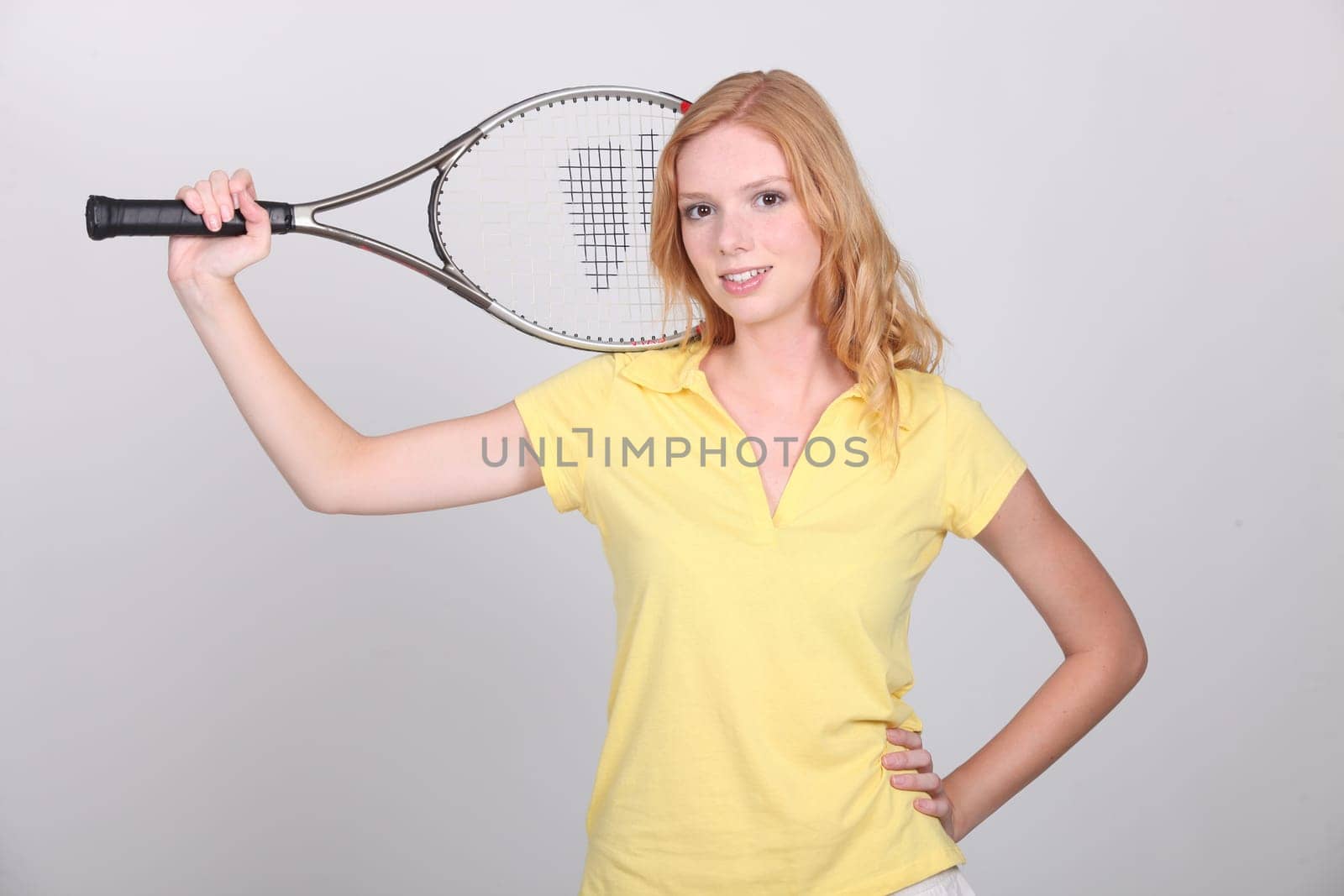 Girl with tennis racket