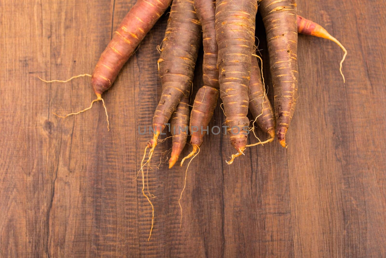 Healthy vegetables Urcarrots in orange and violet