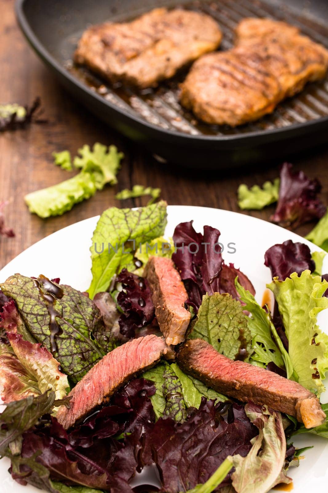 Beef and leaf salad on a plate