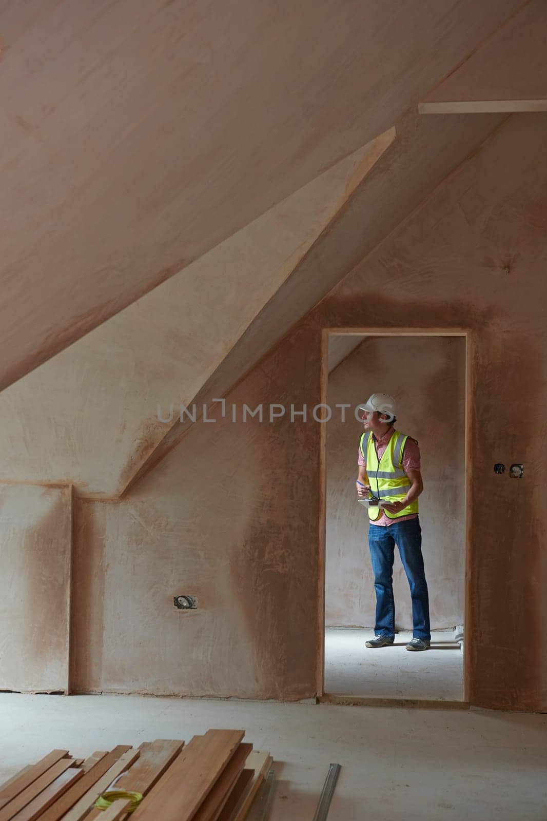 Building Inspector Looking At New Property