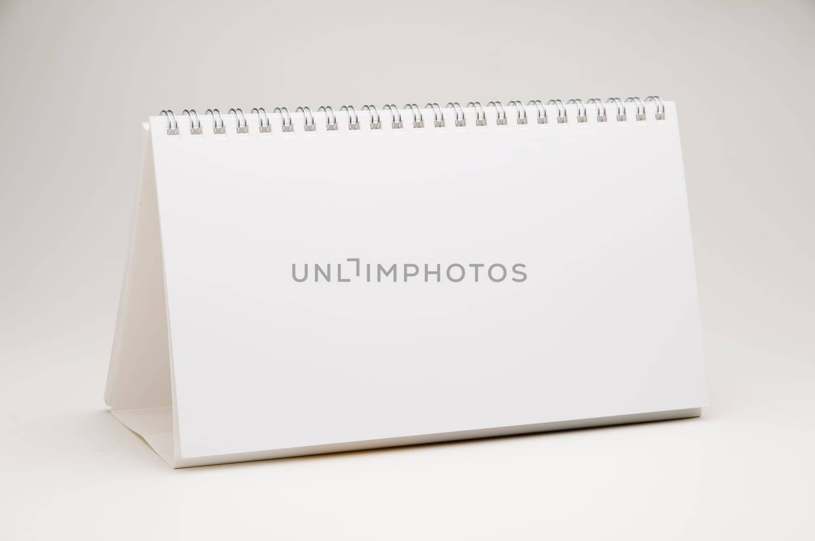 empty ring calendar on white background,format-filling