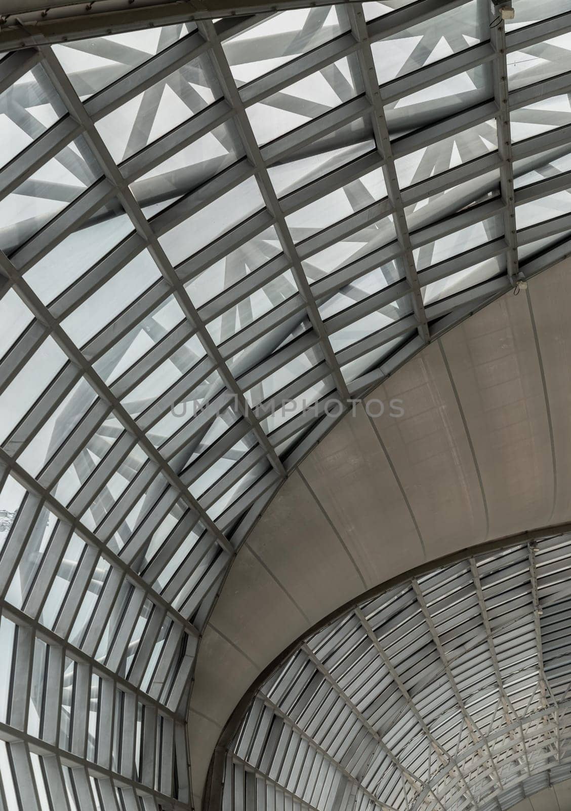 Bangkok, Thailand - Oct 05, 2023 - Modern architecture interior design of metal structure and glass at Suvarnabhumi Departure terminal. Departure area of Suvarnabhumi international airport (BKK). Space for text, Selective focus.