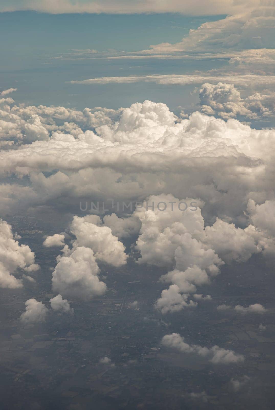 The softness of the clouds and sky with the light shining from the sun. Concept idea of Imaginative clouds nature, Clouds view from airplane, Space for text, No focus, specifically.