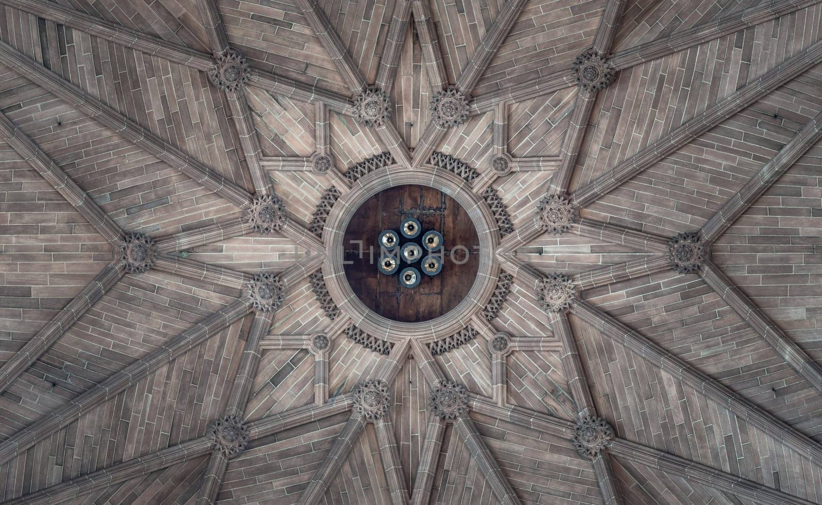 Liverpool, England - Oct 07, 2023 - Elaborate sculptures ceiling design of Liverpool Cathedral. View of a magnificent inside the church, it's the world's largest Anglican cathedral church building, Look up, Space for text, Selective focus.