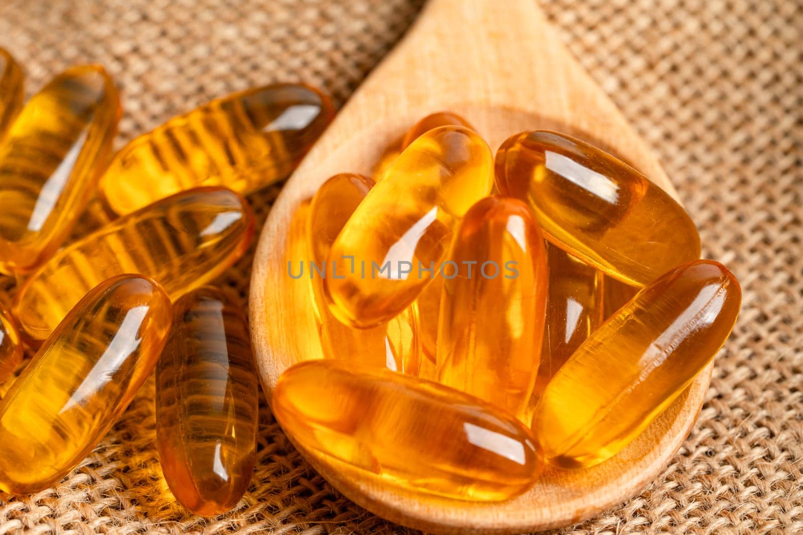 Fish oil Omega 3 capsules vitamin with EPA and DHA isolated on white background.