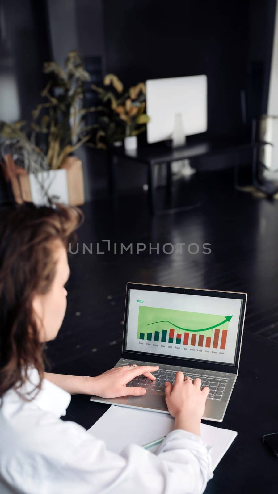 Young woman using laptop computer at home. Business woman working in office. Young Woman Navigates a Versatile Lifestyle: Freelance, Student, E-Learning, Technology, and Online Shopping