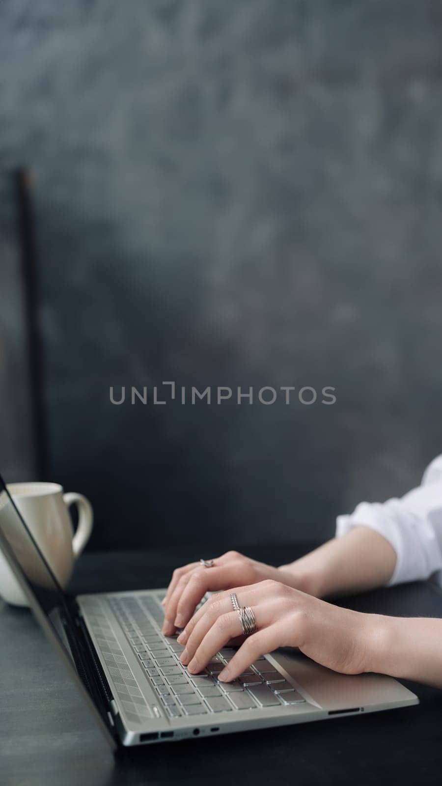 Versatile Woman Balancing Business and Learning. Working from Home, Freelancing, Online Marketing, and Office Workspace. Business woman using laptop at home, woman typing on computer keyboard close-up