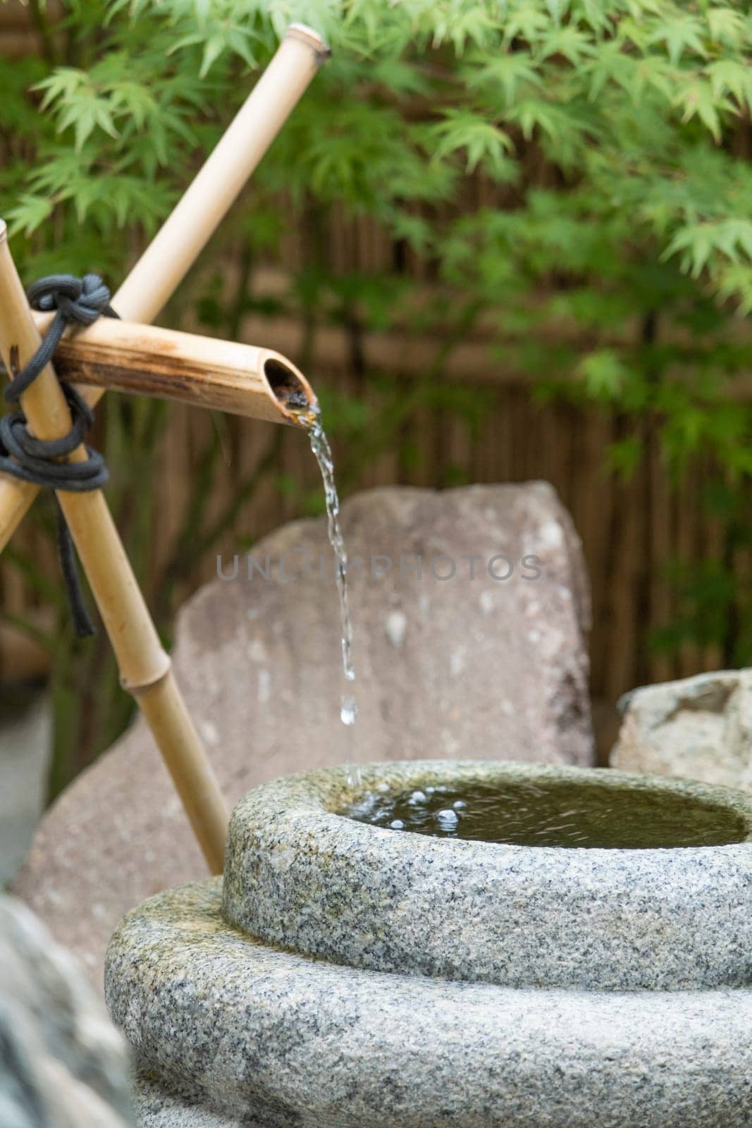 Water ladle and basin for cleansing at shrine in Kyoto, Japan