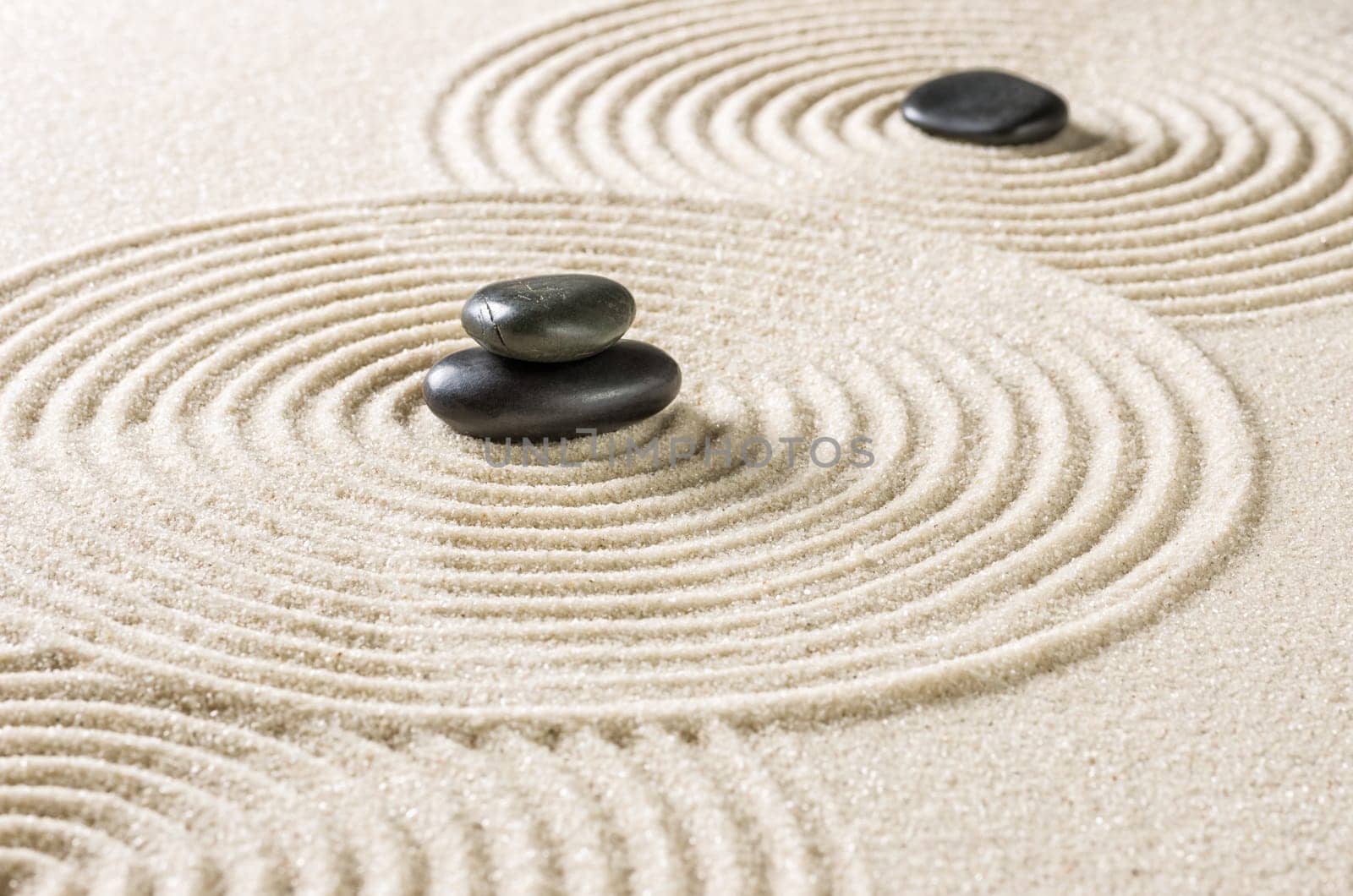 Zen garden with black stones