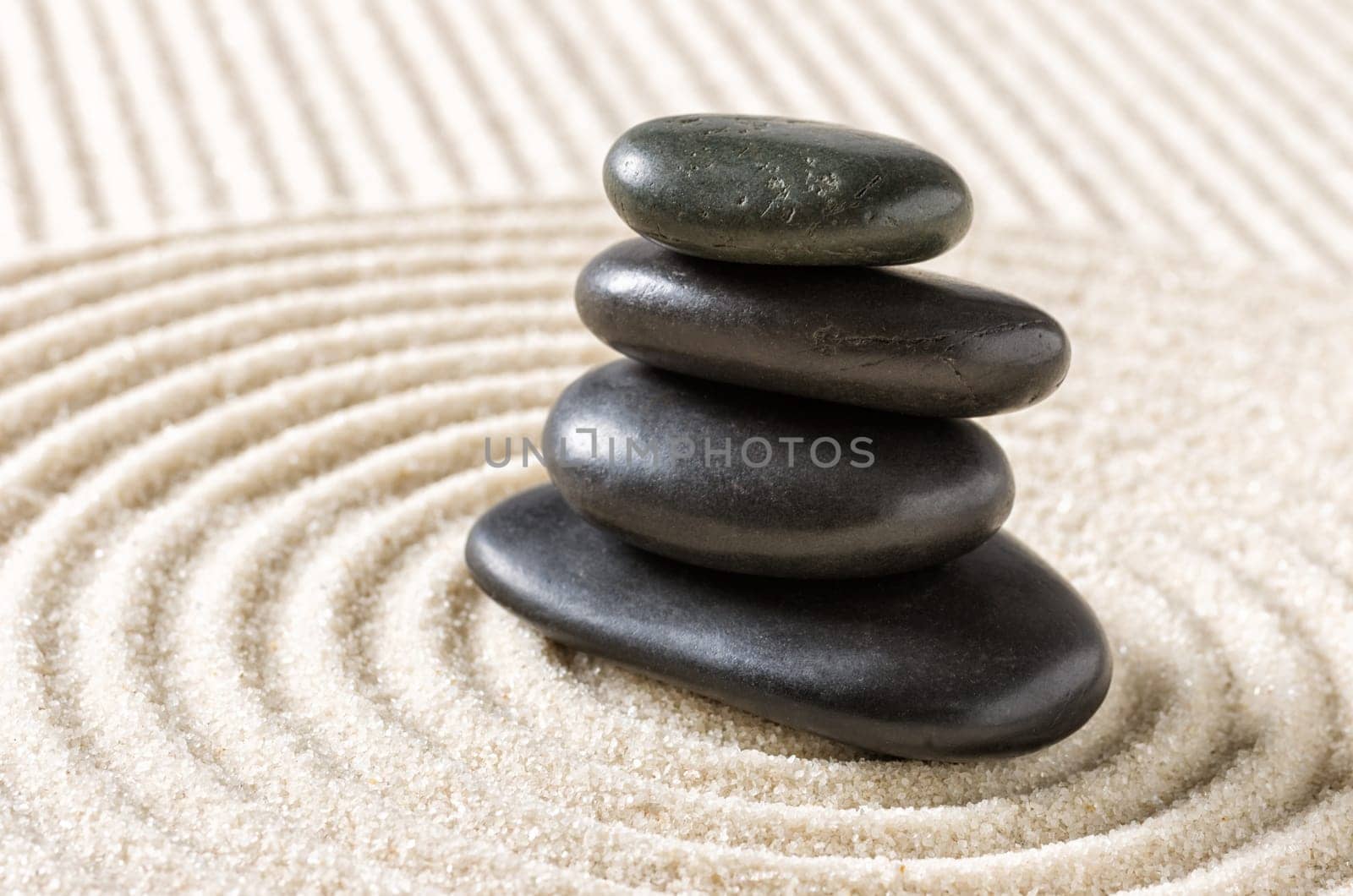 Zen garden with black stones