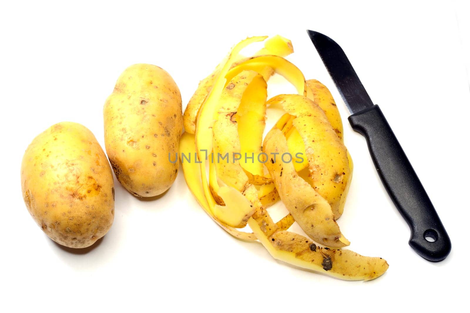 Potatoes Peeling with kitchen knife