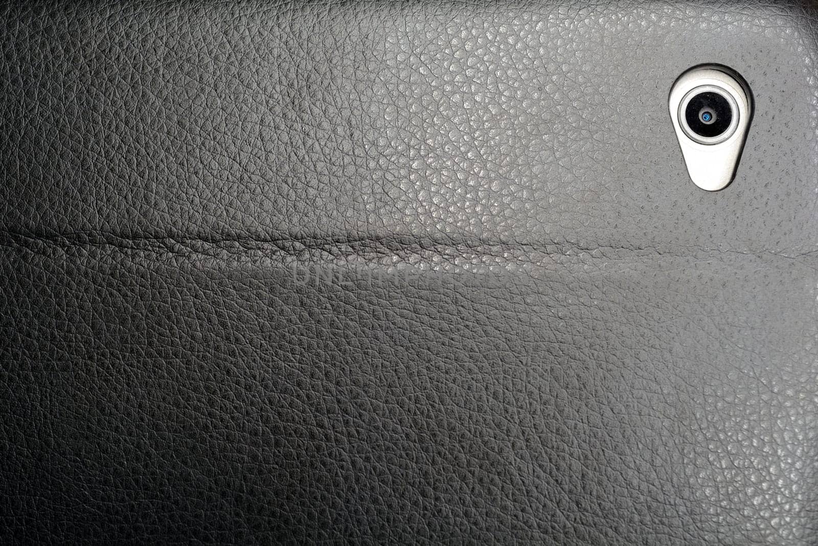 Camera lens on the back of a tablet