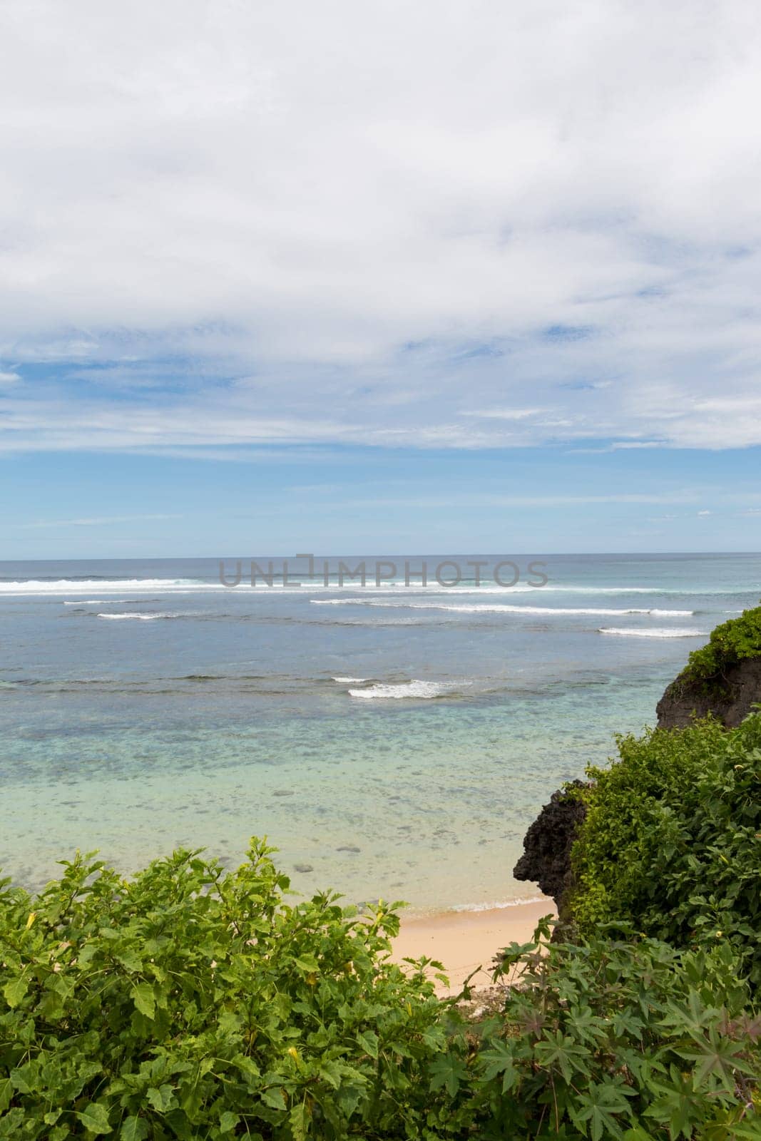 Beautiful secluded sandy beach in the Caribbean with white sand and blue sky as in paradise