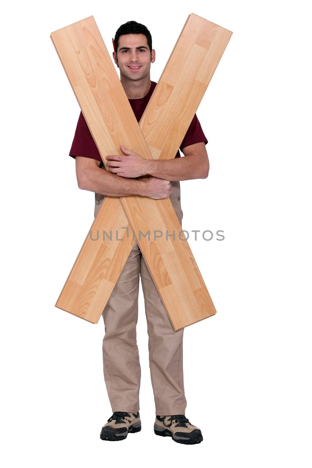 Carpenter with floorboards