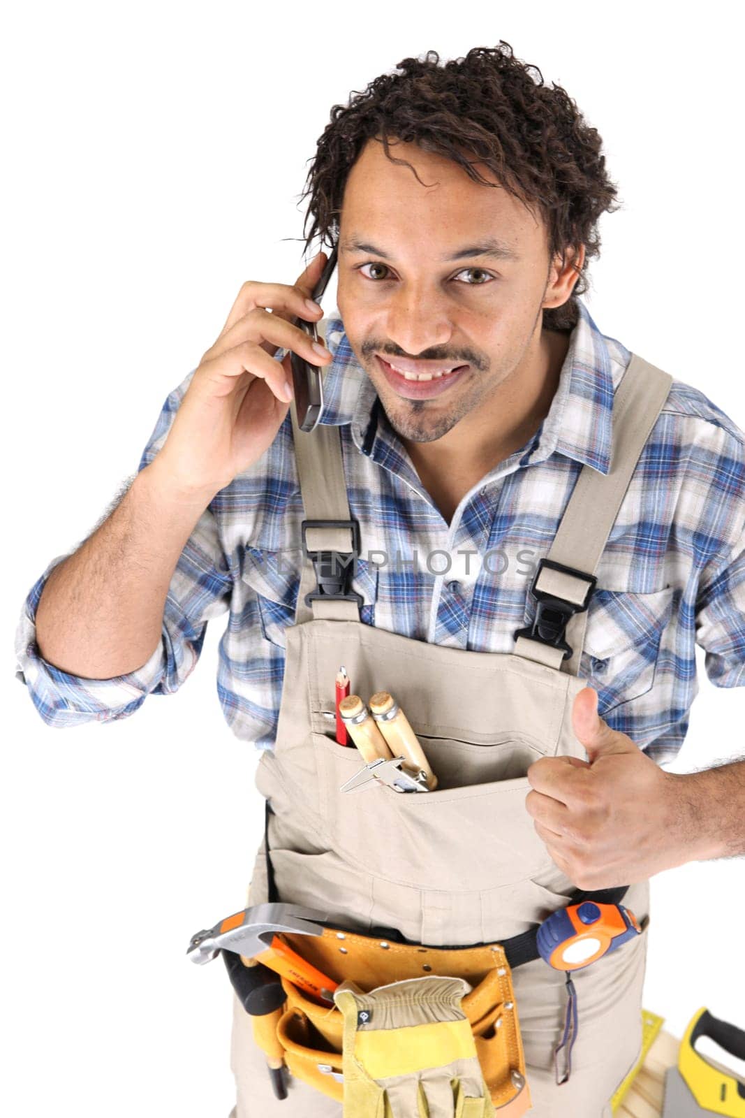 Carpenter receiving good news over the phone