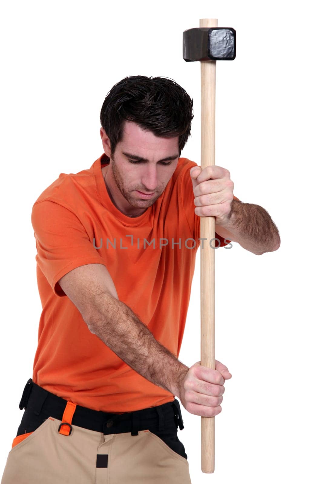 A ma with a sledgehammer.