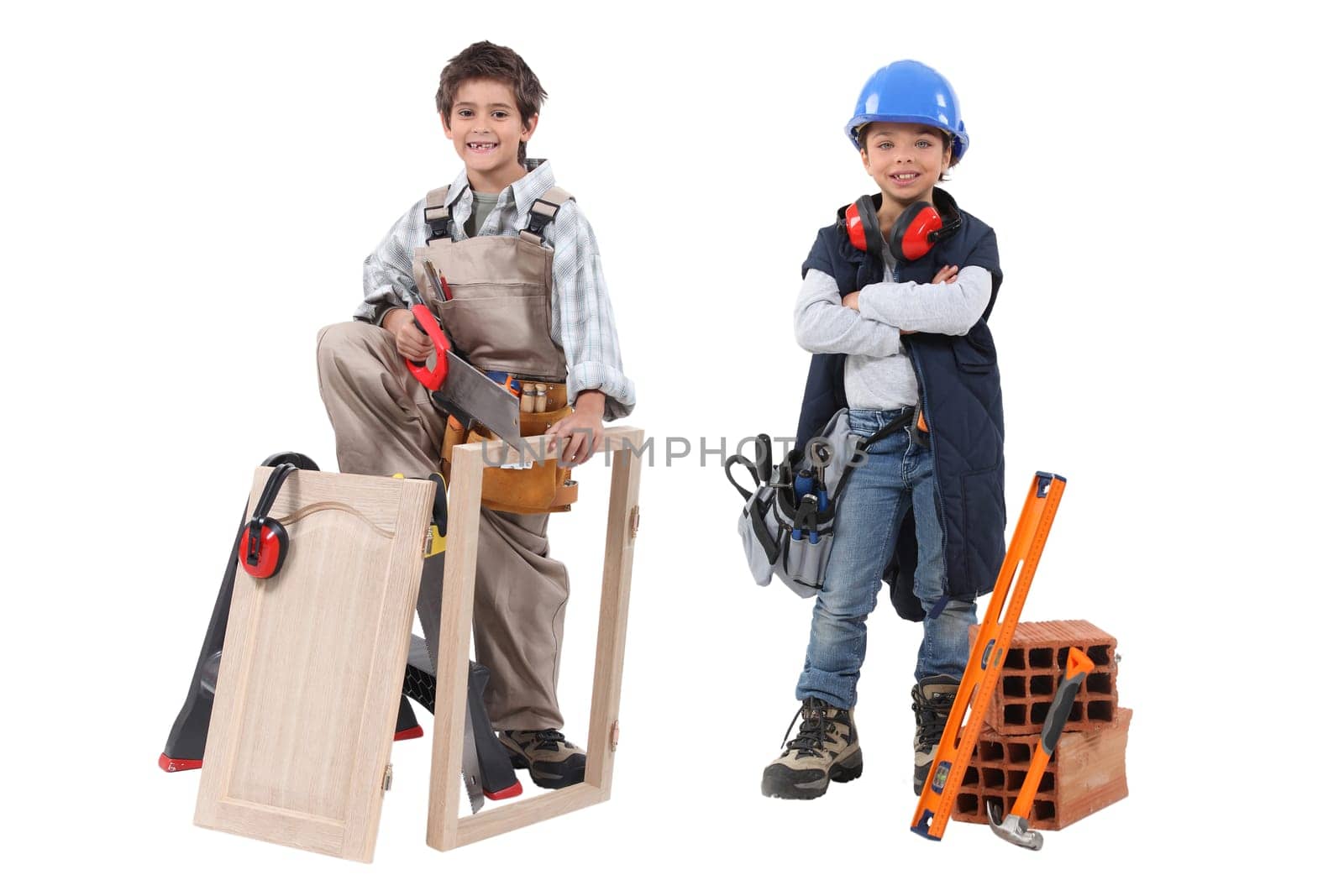 Two children acting out adult trades - carpentry and construction