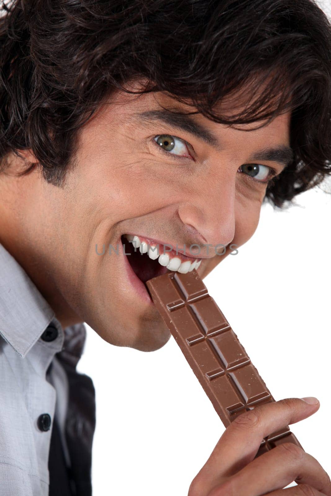 Man with a bar of chocolate