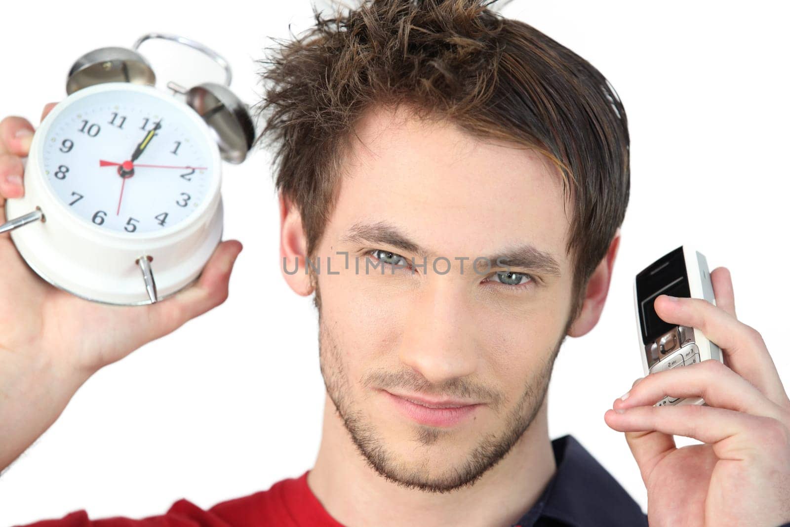 Man stood alarm clock and mobile