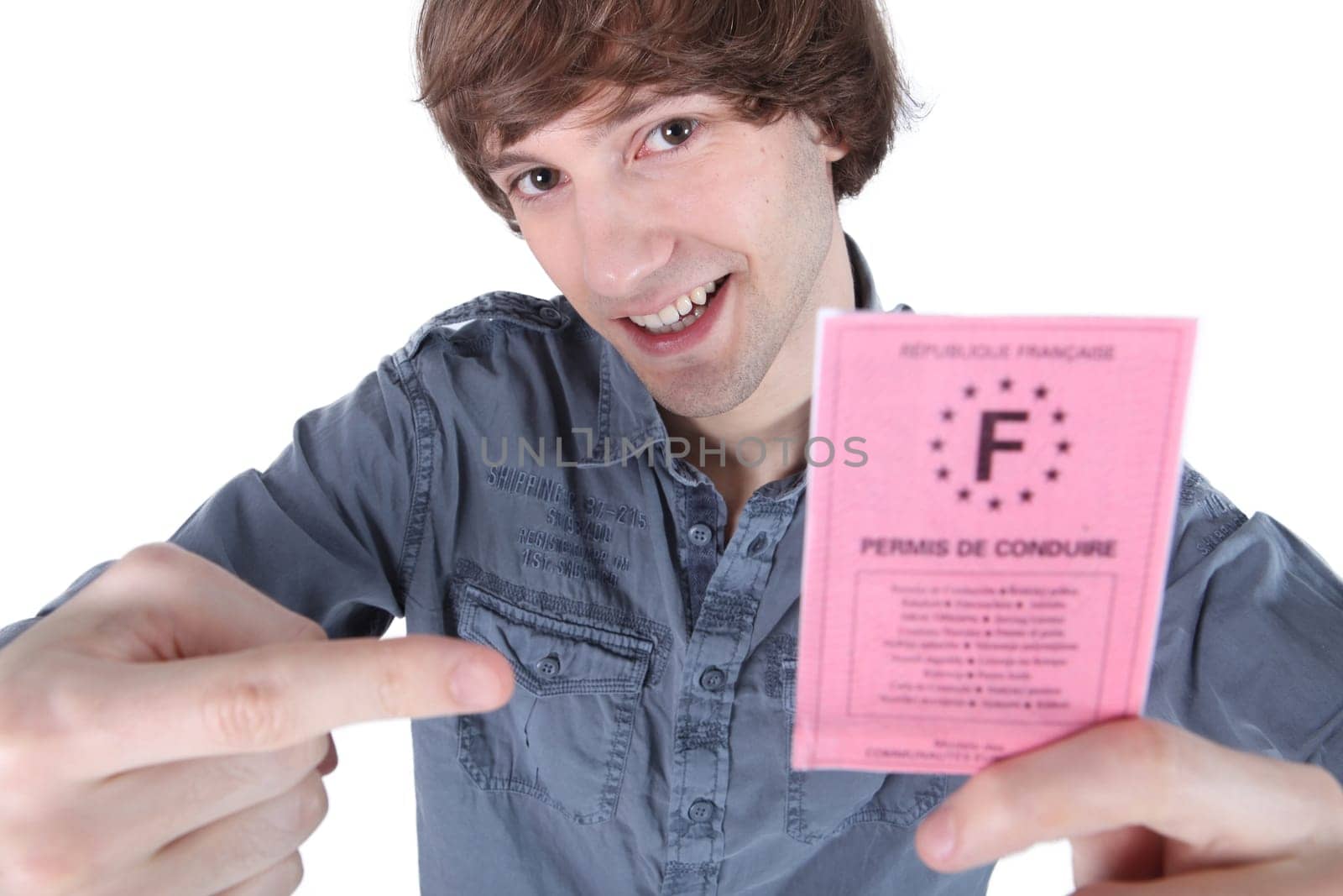 boy with driving license