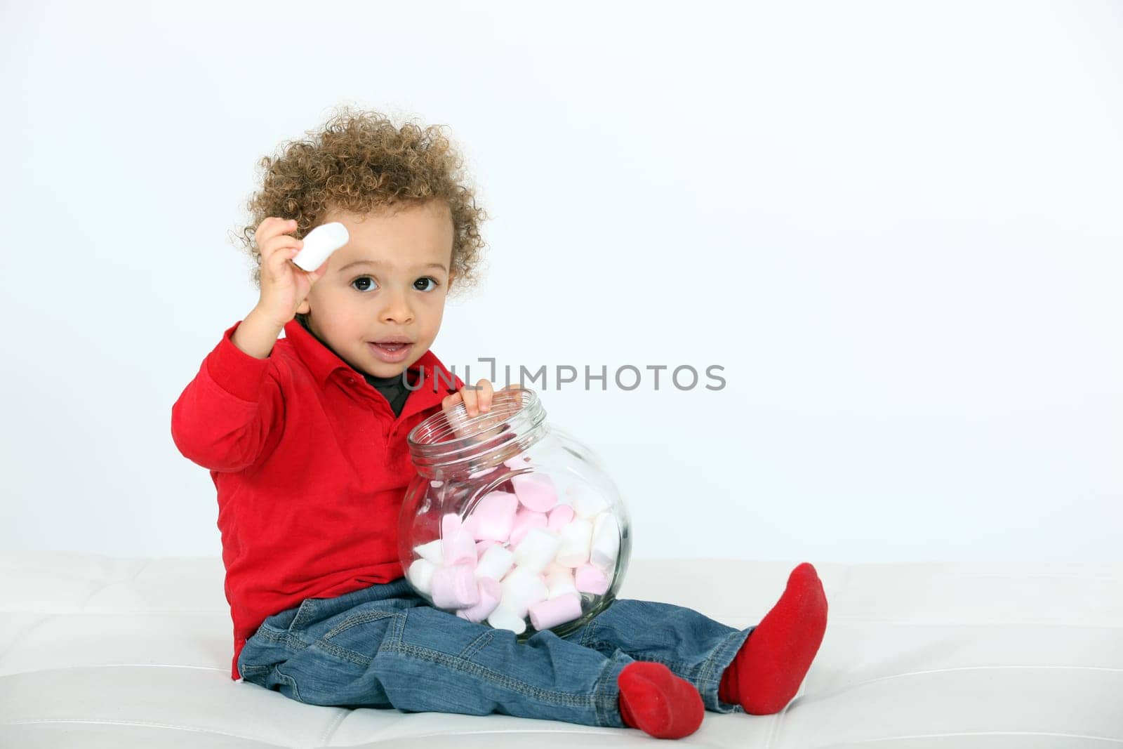 Little boy with bowl of marshmallows