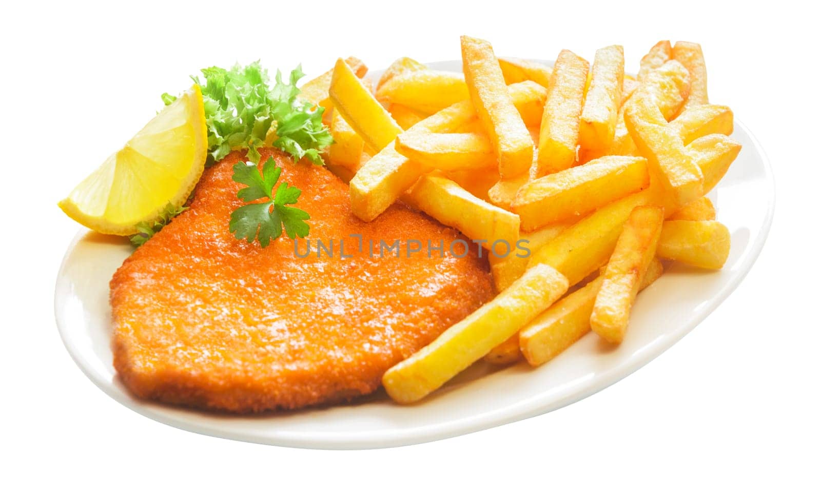 Fried crumbed veal escalope with crispy golden French fries served with a lemon wedge and garnished with lettuce and parsley, isolated on white
