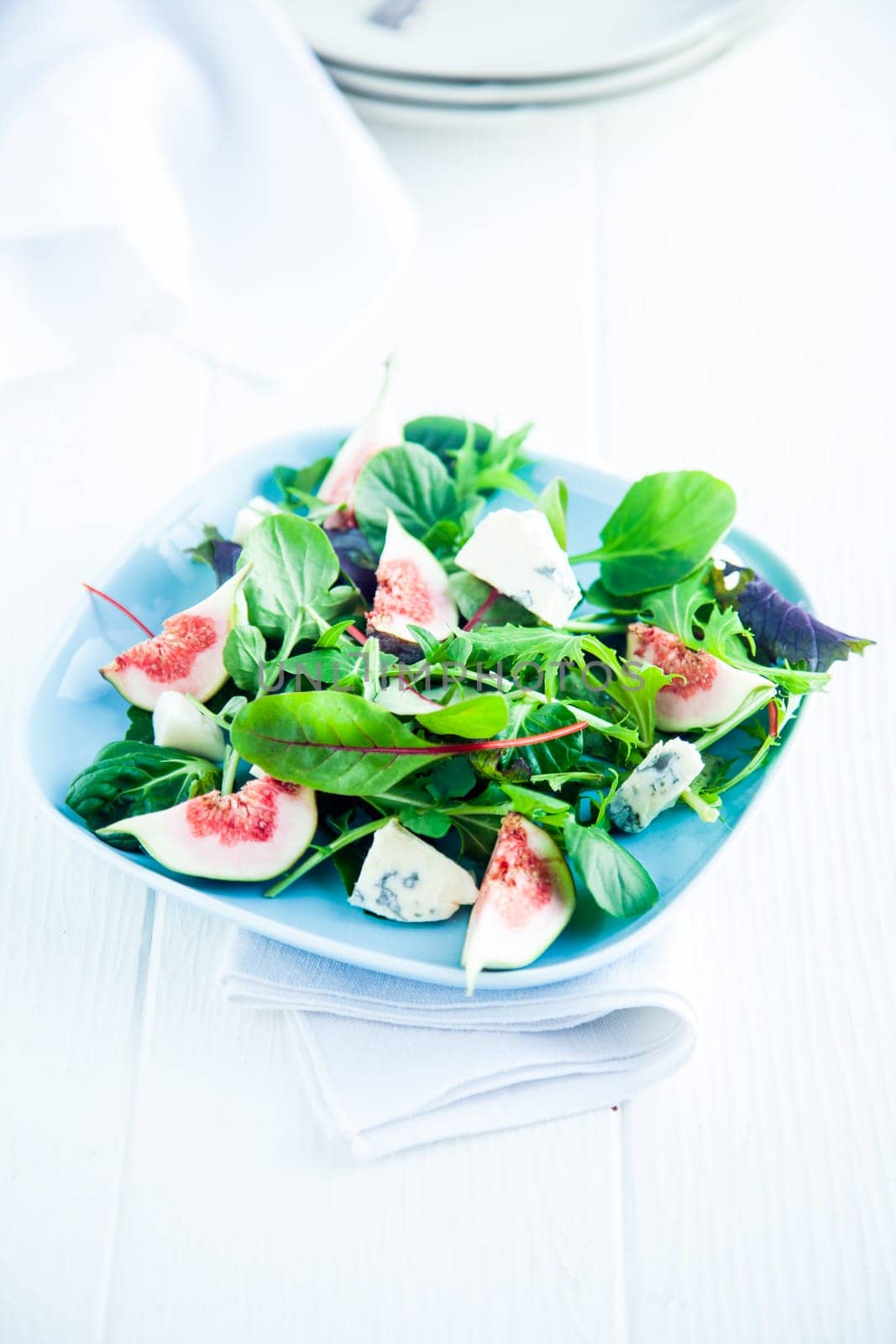 Fresh Salad on Plate Isolated on White. Good for Vegetarians