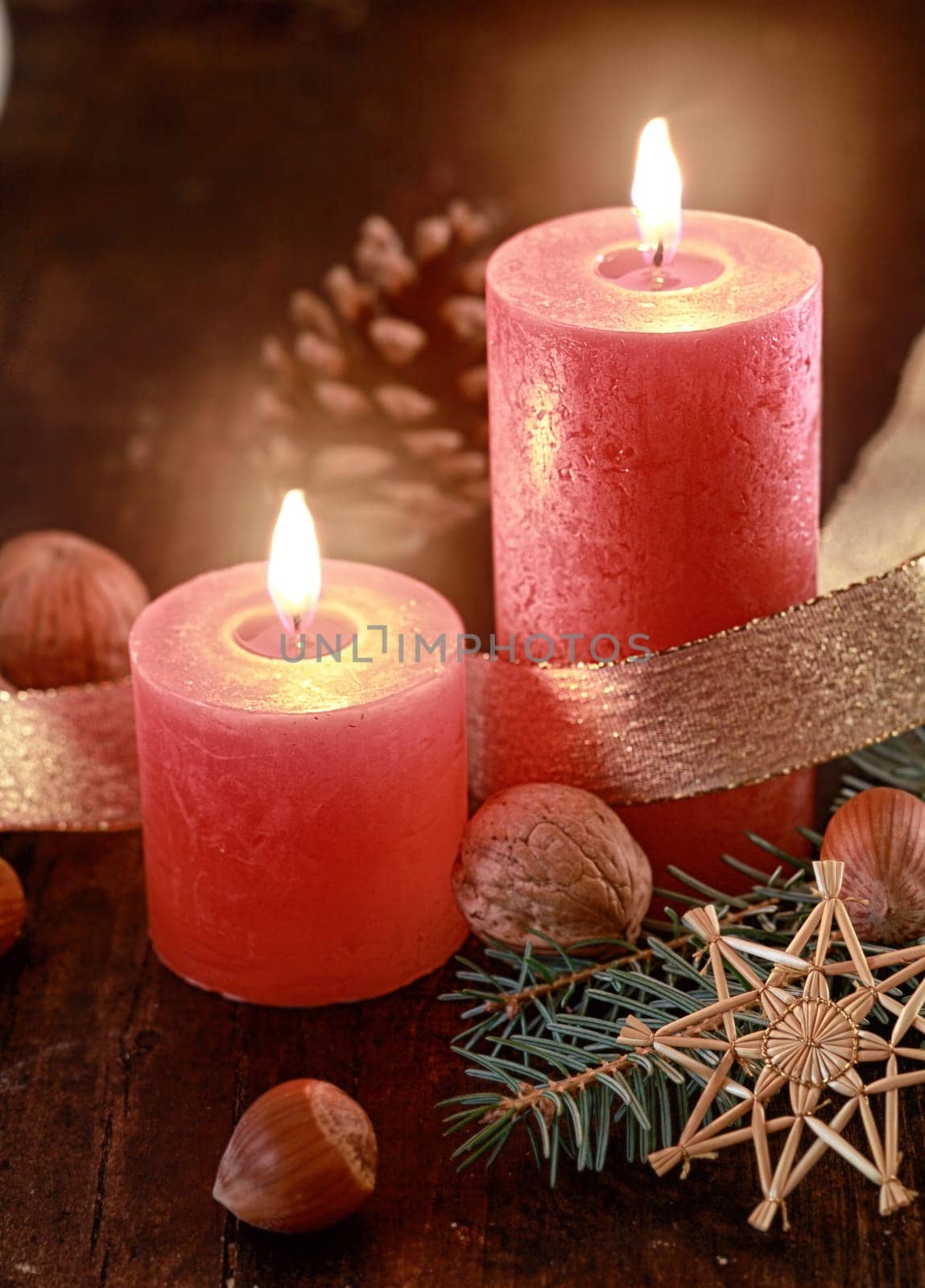 Lighted candles on decorated table - Christmas concept