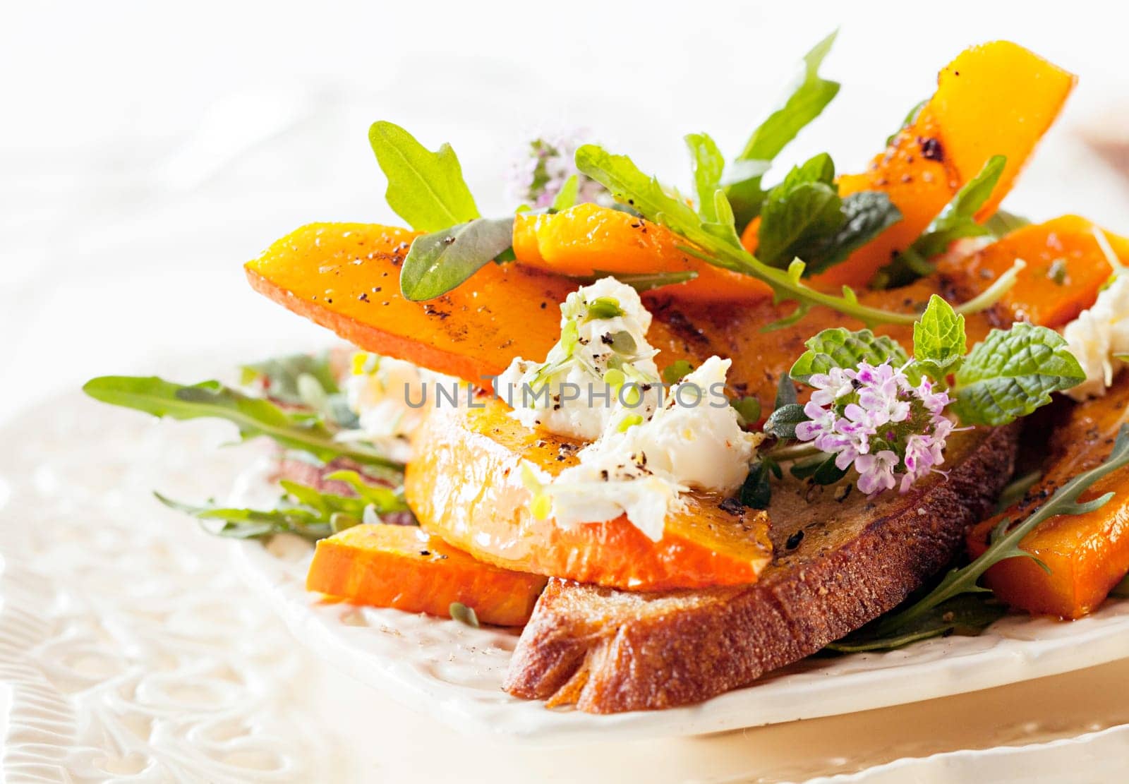 Appetizing Gourmet Hokkaido Rocket Salad Served on Table. Ready to Eat Delicious Food.