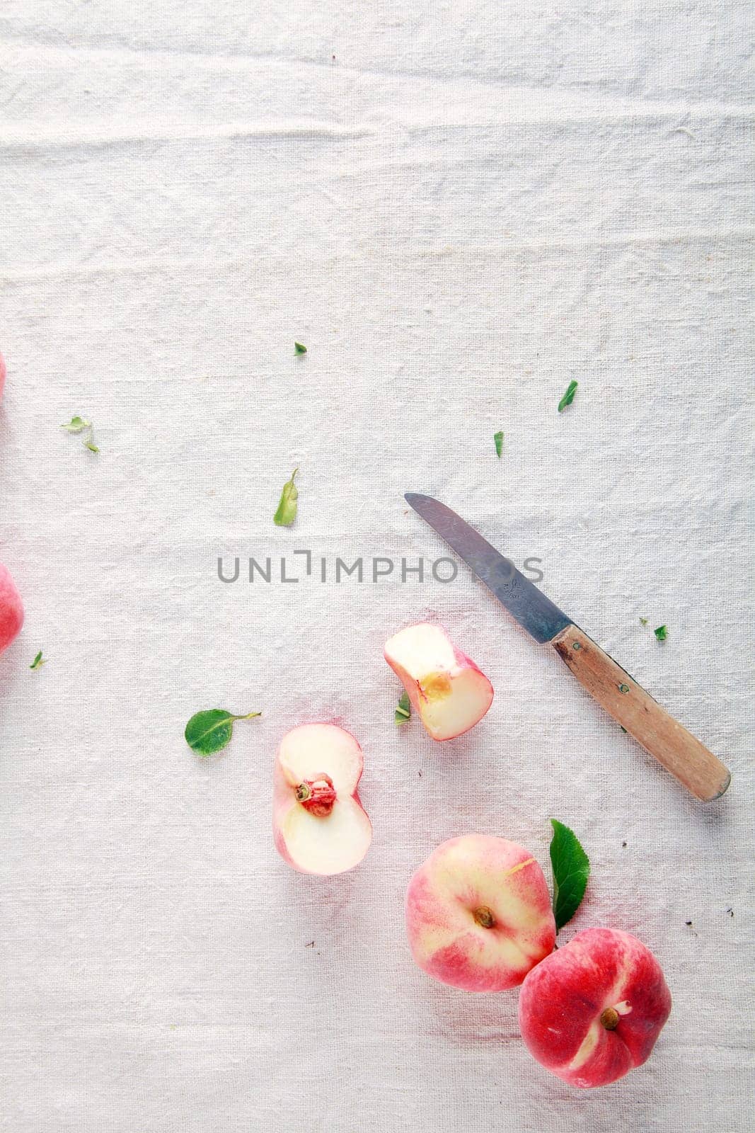 Ready to Eat Sliced Fresh Apple on White Table Cloth