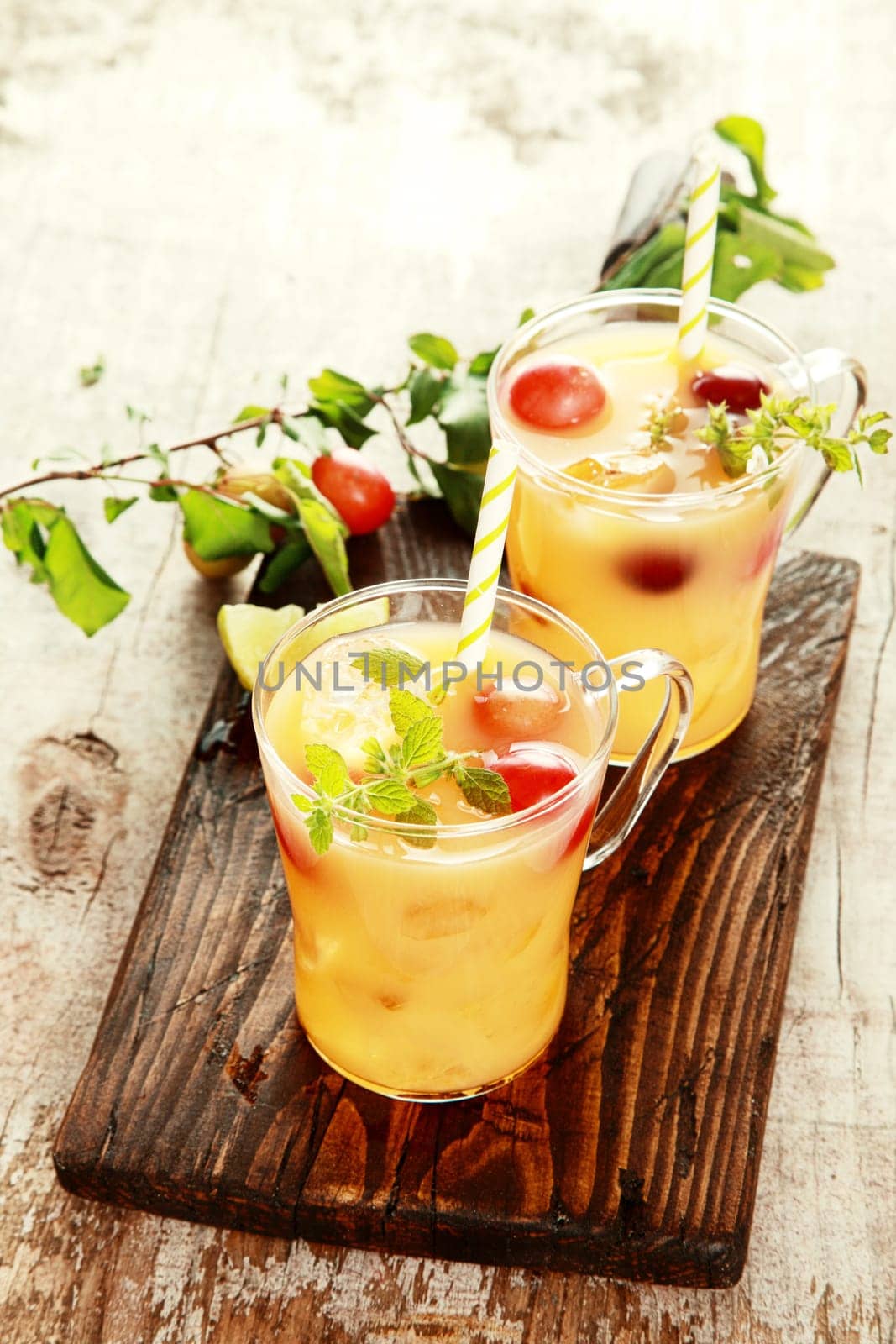 Two Healthy Delicious Fruit Juices on Wooden Table. Good for Detoxifying.