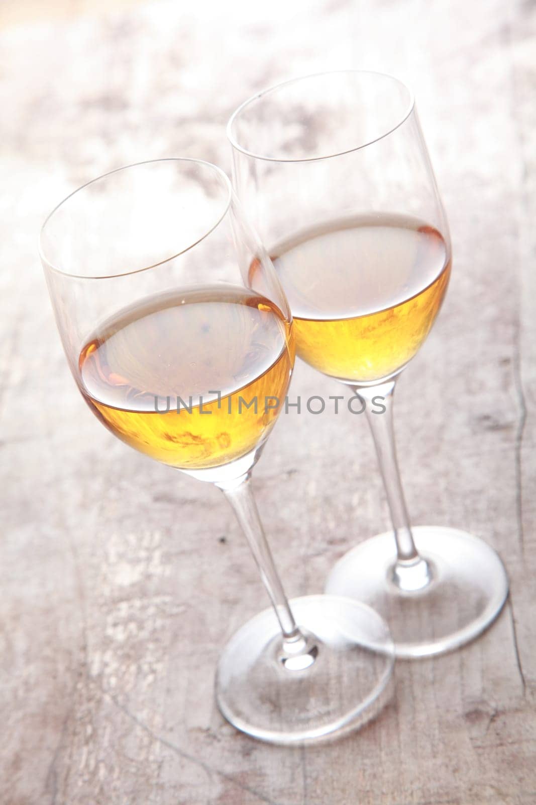 Two Champagne in Glasses on Wooden Table Ready to Serve for Partners. Good for Lowering Blood Pressure.