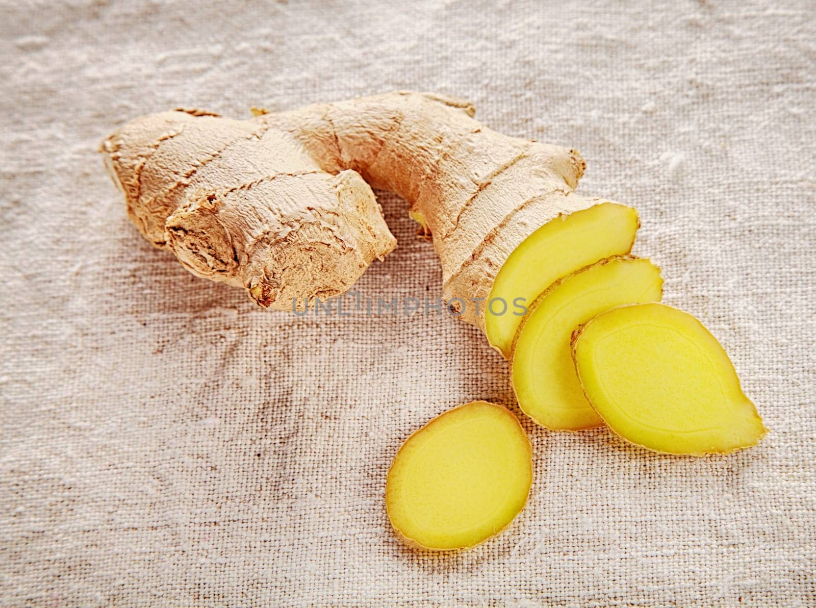 Clean Sliced Ginger on White Cloth Good for Cancer Prevention